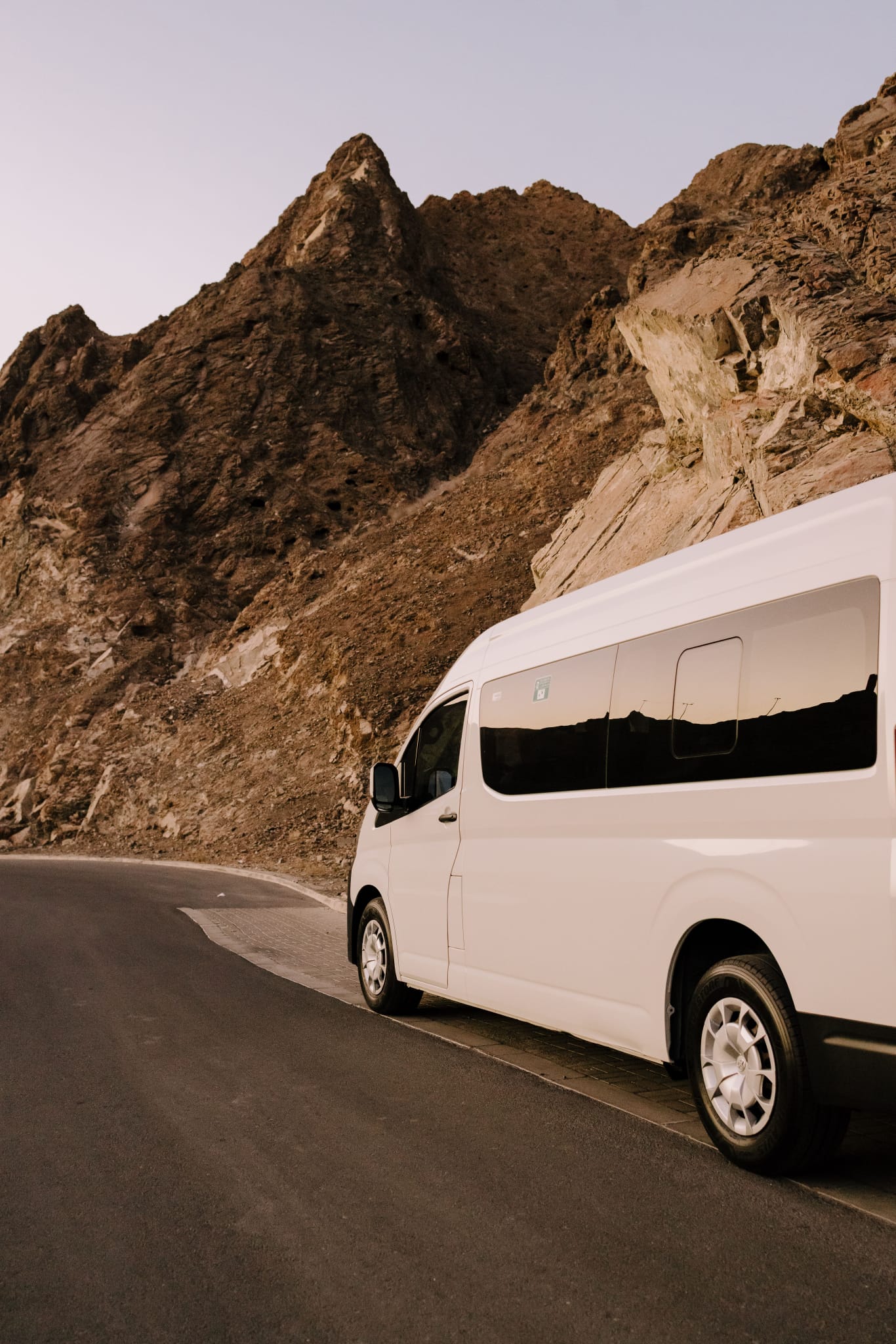 Private transfer in a comfortable modern van on a scenic mountain road